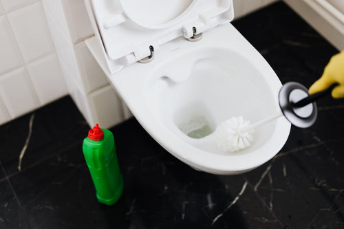 A Step-By-Step Guide to Unclogging Your Filled Toilet