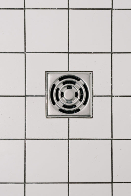 How to Fix Shower Drain Noises before They Get Worse