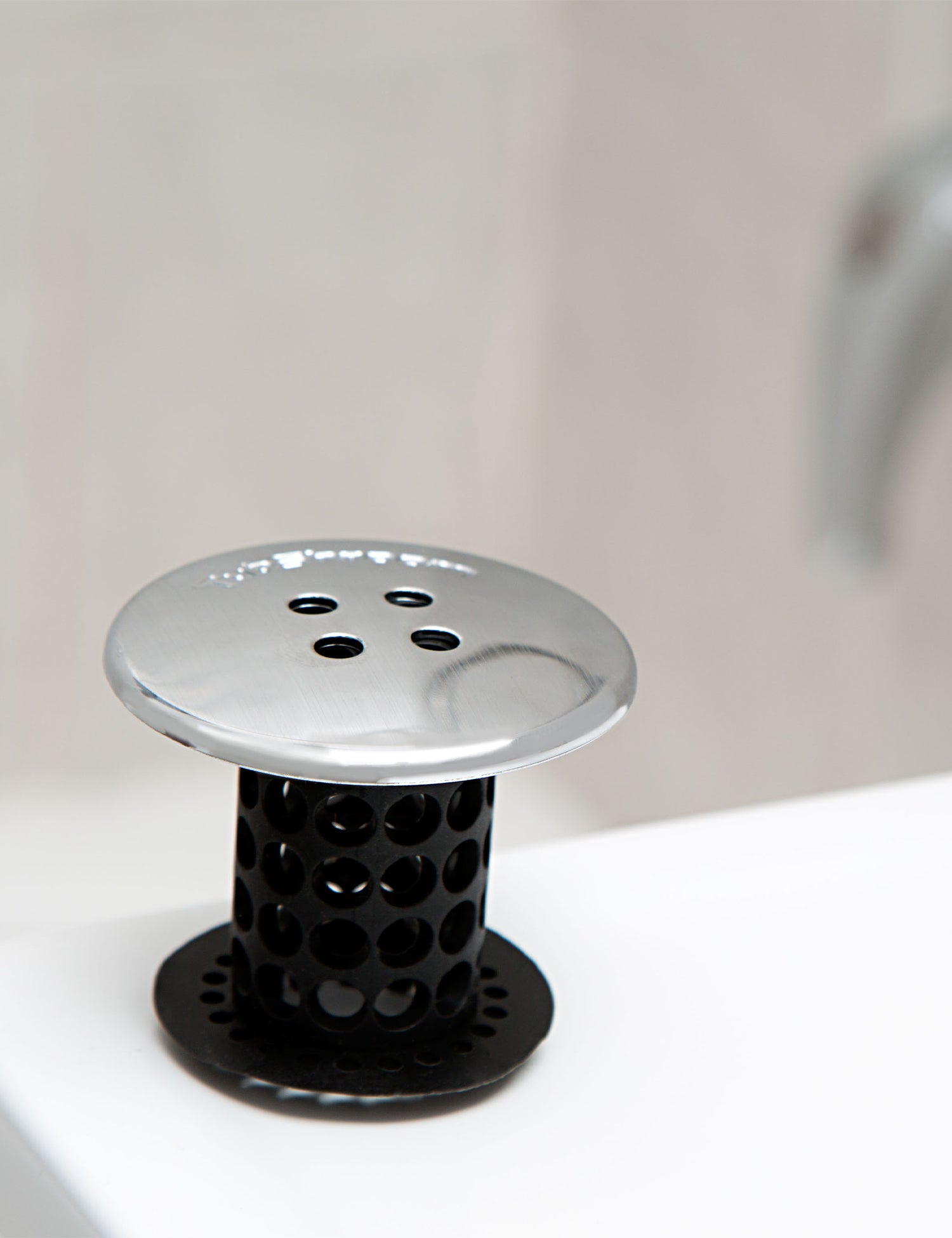 TubShroom® (Black Chrome) The Hair Catcher That Prevents Clogged Tub Drains Drain Protector Juka Innovations Corporation 